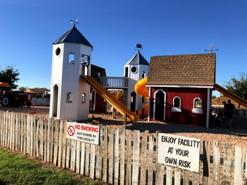 playground that looks like farm buildings