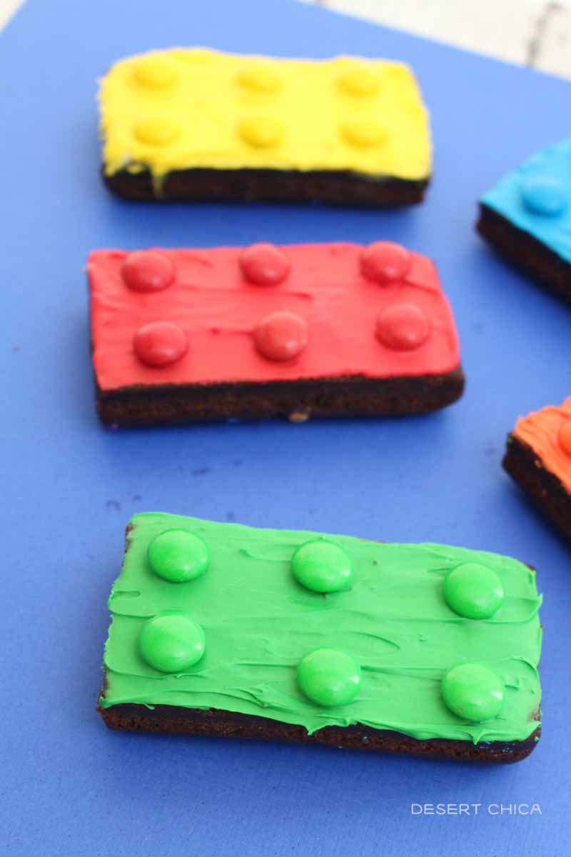 Red, and green decorated brownies that look like LEGO bricks