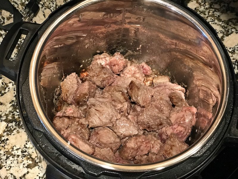 Saute and brown beef for easy instant pot beef stew or 21 day fix instant pot beef stew recipe