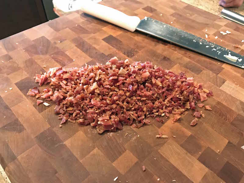 Chop bacon to add to easy instant pot potato soup recipe