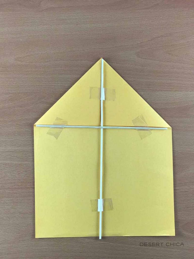 Add a smaller wood dowel under the folded corners when making a Mary Poppins Paper Kite