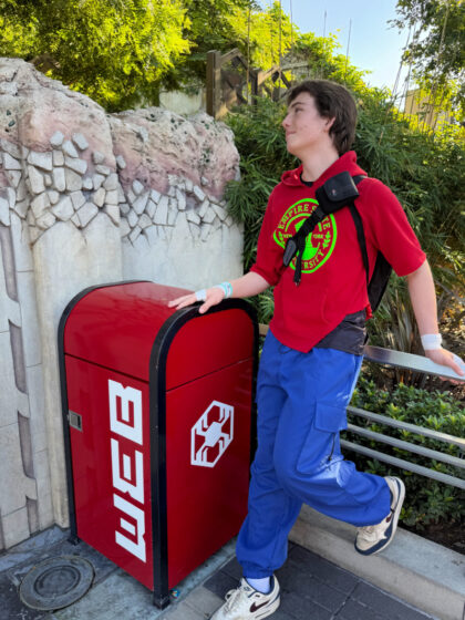 Bombastic Bag-man spider-man leaning against a web can on Avengers Campus at Disneyland