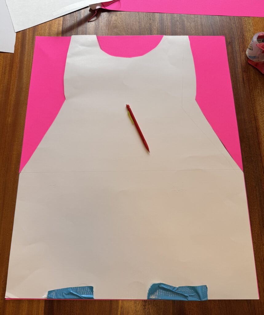 White poster board template for making a DIY Princess Peach dress